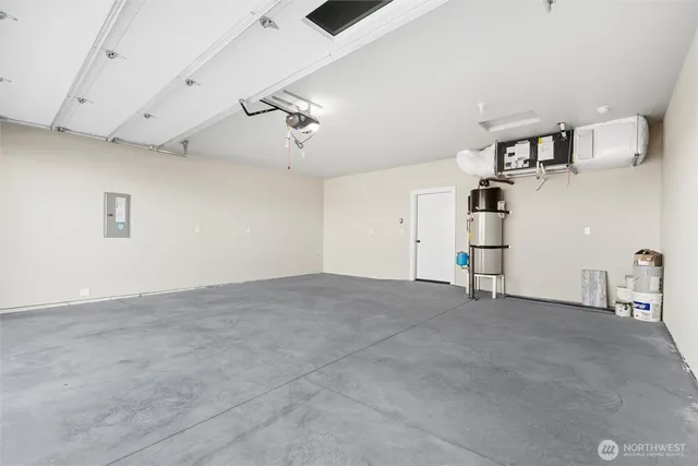 a view of empty room with ceiling fan
