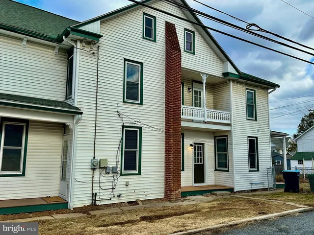 a view of a house with a patio