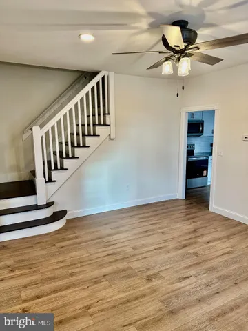a view of an ocean with wooden floor
