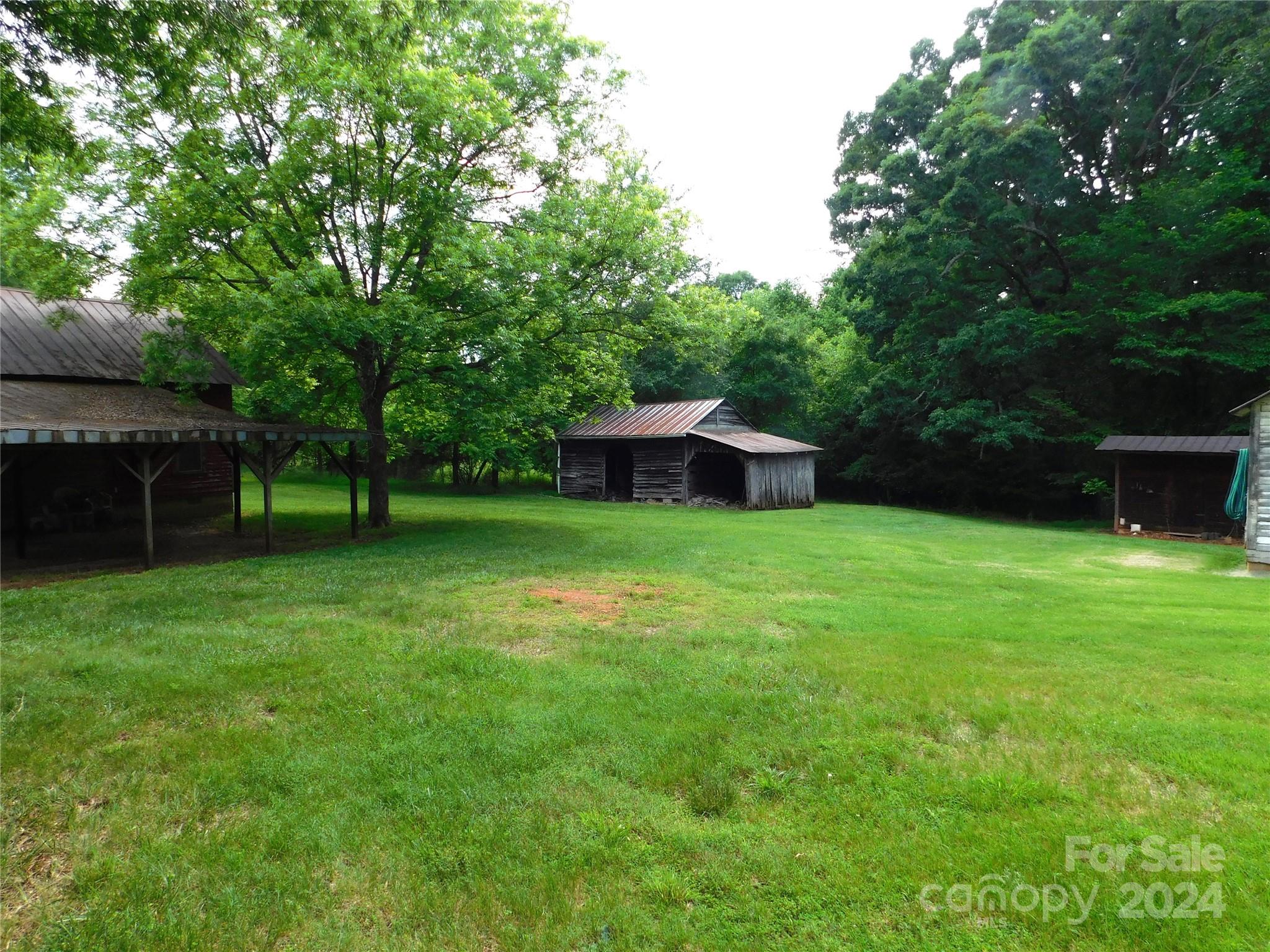 175 Fairmount Road Statesville, NC 28625 - Photo 15 of 30 a view of a house with a yard