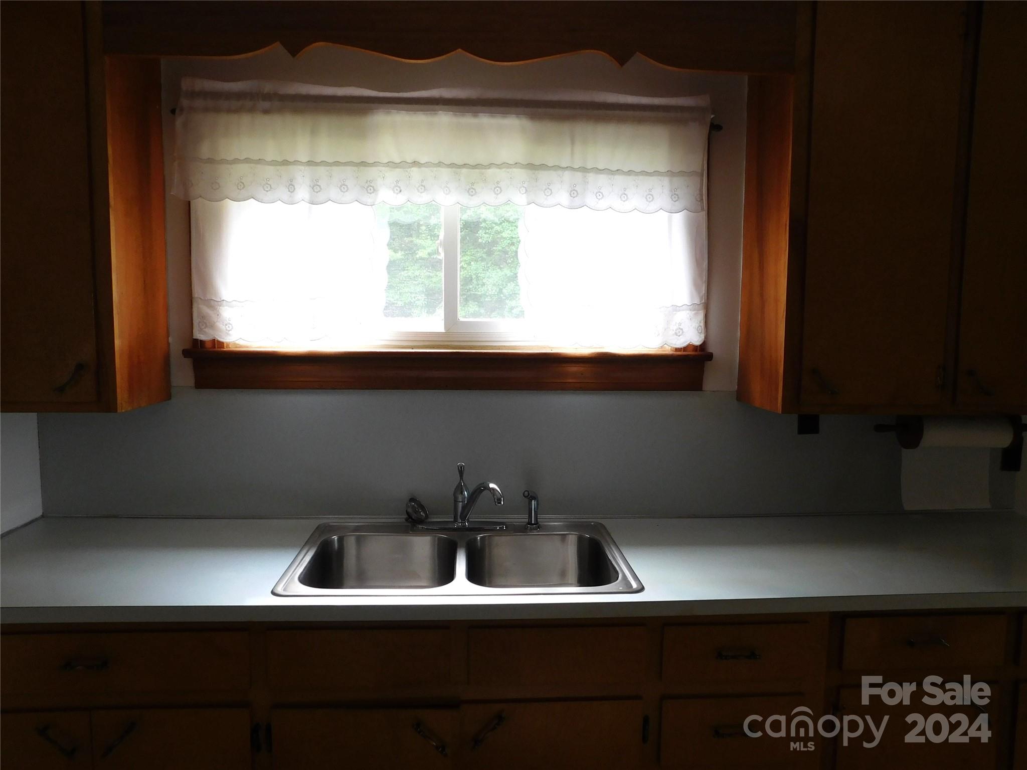 175 Fairmount Road Statesville, NC 28625 - Photo 21 of 30 a bathroom with a sink and a window