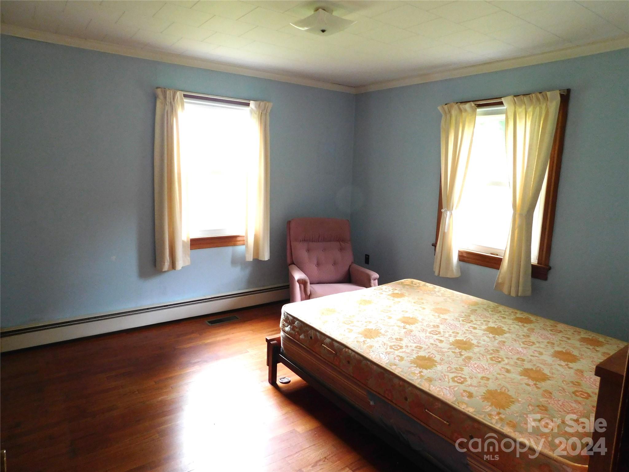 175 Fairmount Road Statesville, NC 28625 - Photo 24 of 30 a bedroom with a bed and window