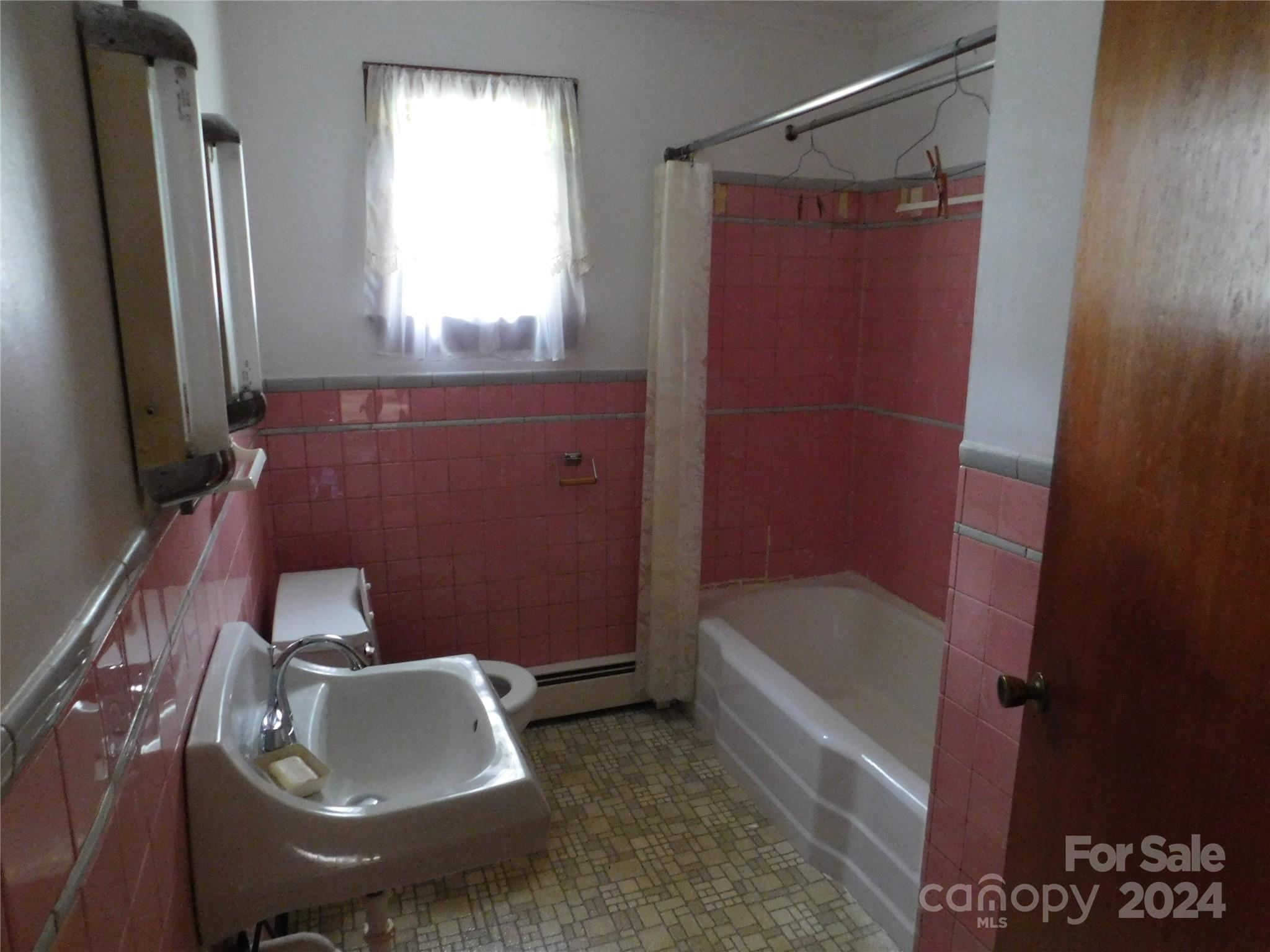 175 Fairmount Road Statesville, NC 28625 - Photo 25 of 30 a bathroom with a tub a sink and a shower