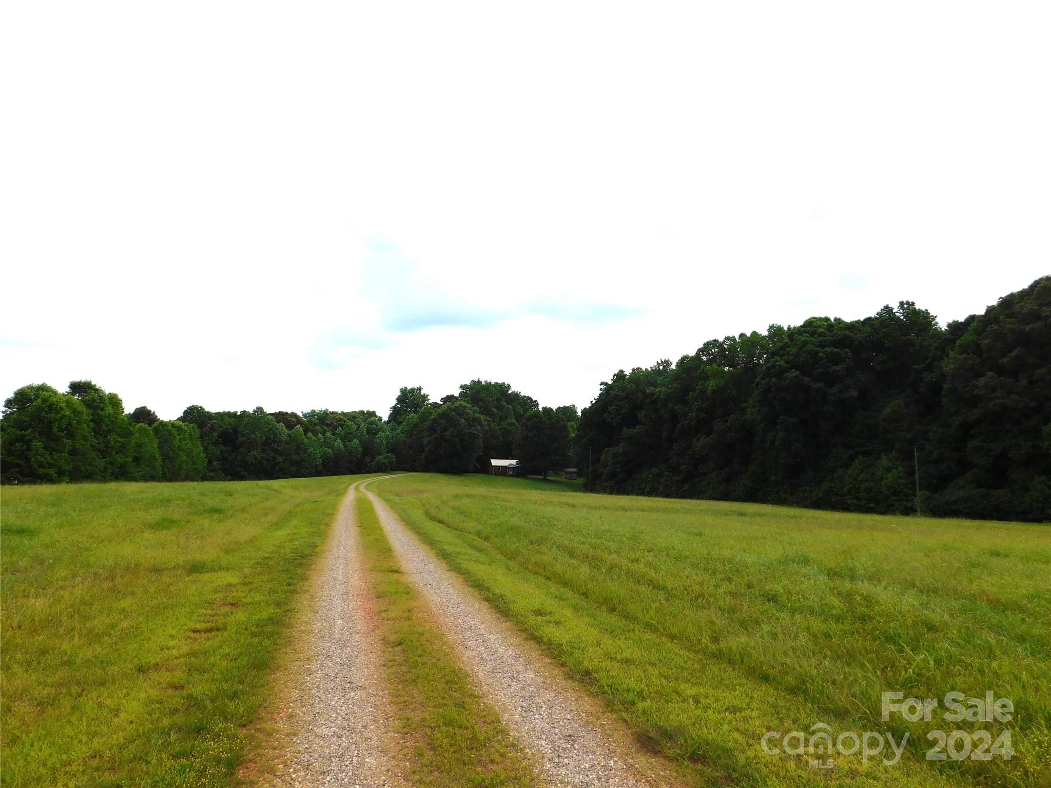 175 Fairmount Road Statesville, NC 28625 - Photo 9 of 30 a view of a field with an ocean