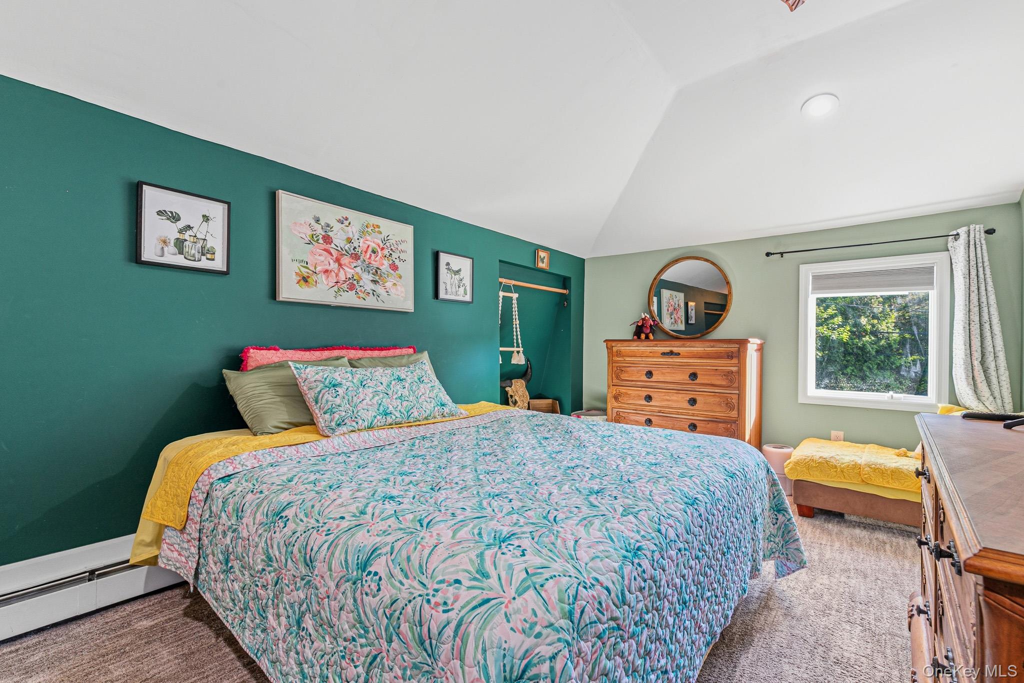 33 Lillian Road Nesconset, NY 11767 - Photo 24 of 42 The Stunning Primary Bedroom Suite Offers Beautiful Vaulted/Tray Ceilings, Recessed Lighting, Ceiling Fan, Oversized Windows For Natural Light, Beautiful Details Including Two Wall Cut Outs/Niches, Ample Room For A Large Bedroom Set/Furniture, A Large Walk In Closet With Built In Cabinetry/Shelving & Storage, And A Stunning New Primary Bathroom.