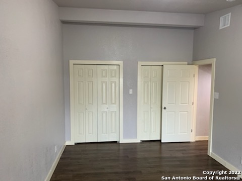 520 Gentleman Road, Unit 4 Balcones Heights, TX 78201 - Photo 9 of 13 a view of an empty room and wooden floor