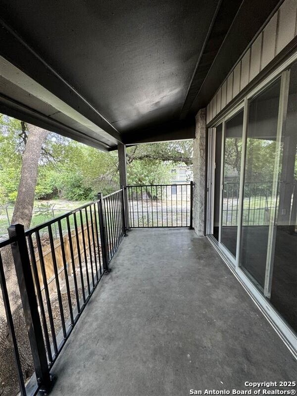 520 Gentleman Road, Unit 4 Balcones Heights, TX 78201 - Photo 10 of 13 a view of porch with green trees