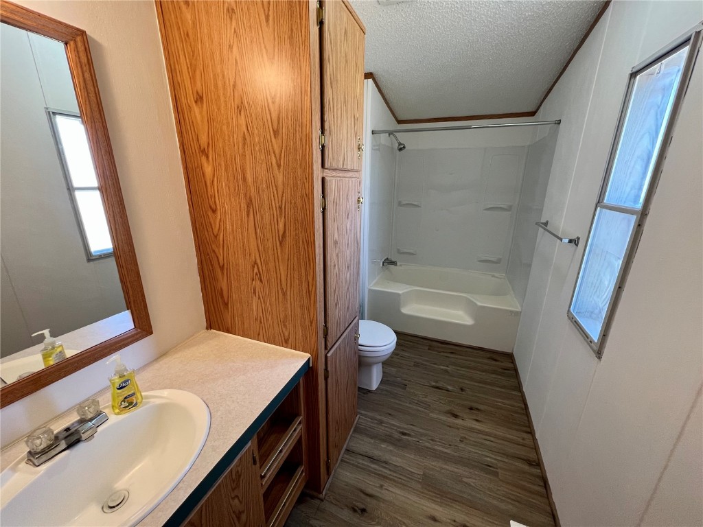 7429 Remington Road Como, CO 80432 - Photo 12 of 21 a bathroom with a sink a toilet a tub and shower