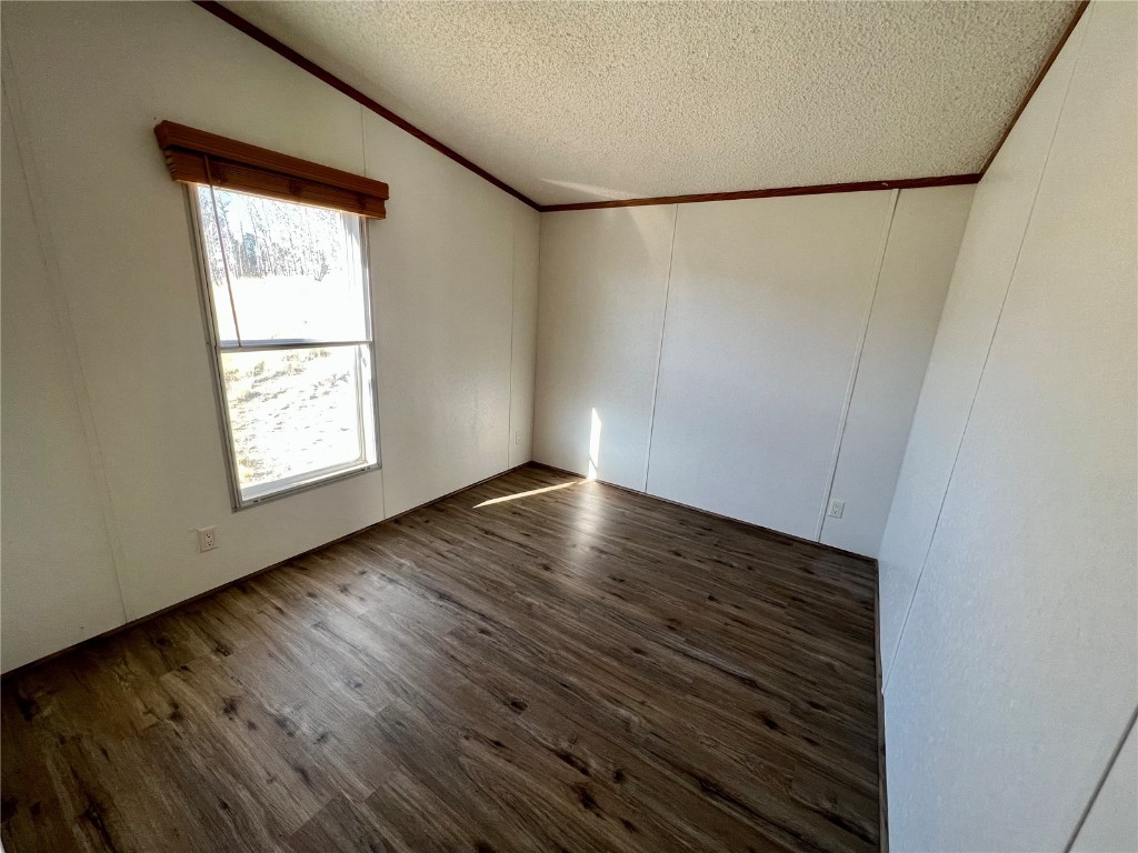7429 Remington Road Como, CO 80432 - Photo 14 of 21 a view of an empty room with wooden floor and a window