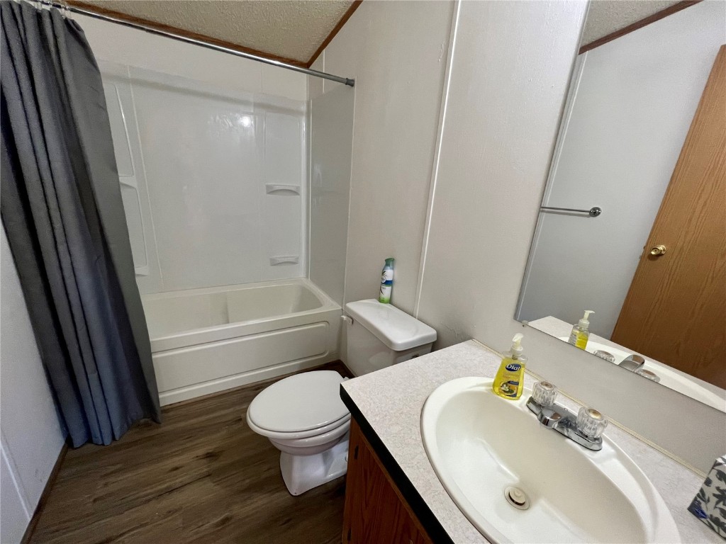 7429 Remington Road Como, CO 80432 - Photo 15 of 21 a bathroom with a sink toilet and shower