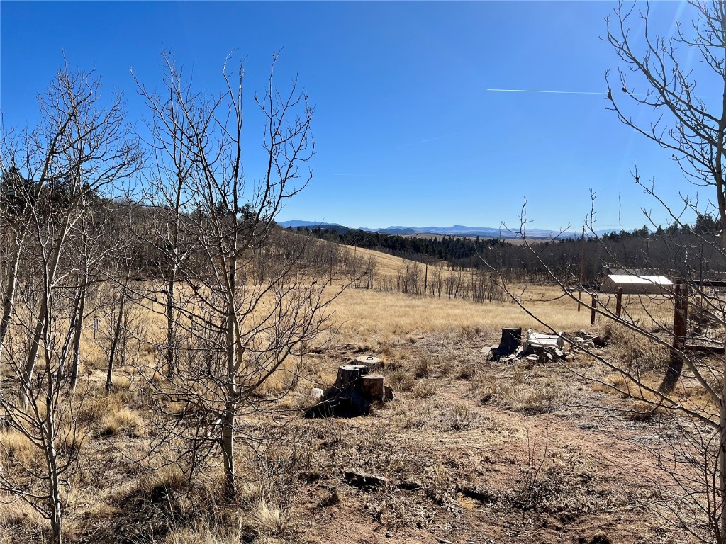 7429 Remington Road Como, CO 80432 - Photo 17 of 21 a view of a large body of water with a house in the background