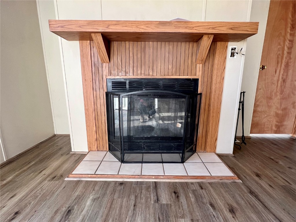 7429 Remington Road Como, CO 80432 - Photo 9 of 21 a view of a fireplace with wooden floor