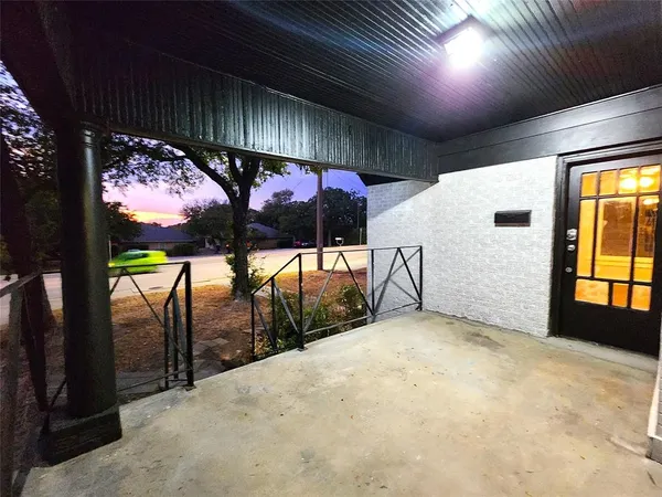 a view of swimming pool with a patio