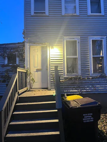 a view of swimming pool with outdoor seating
