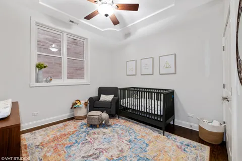 a bedroom with furniture and a window