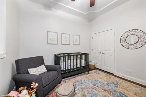 a bedroom with furniture and a window