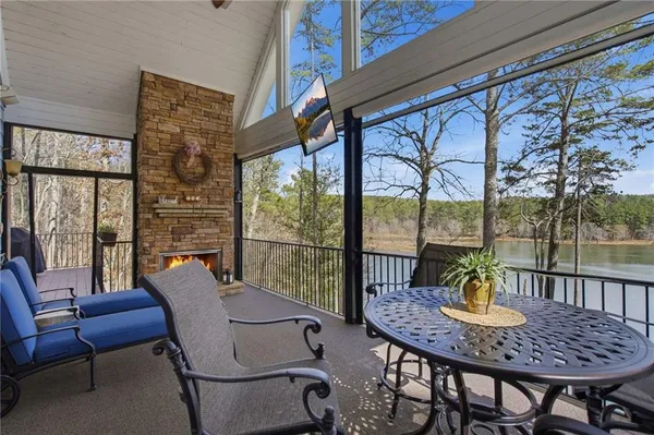 a view of a dining room with furniture window and outside view