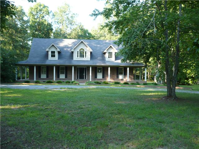 245 Warner Smith Road Tullahoma, TN 37388 - Photo 1 of 20 Front view of this beautiful home, wrap around porch, fantastic front yard.