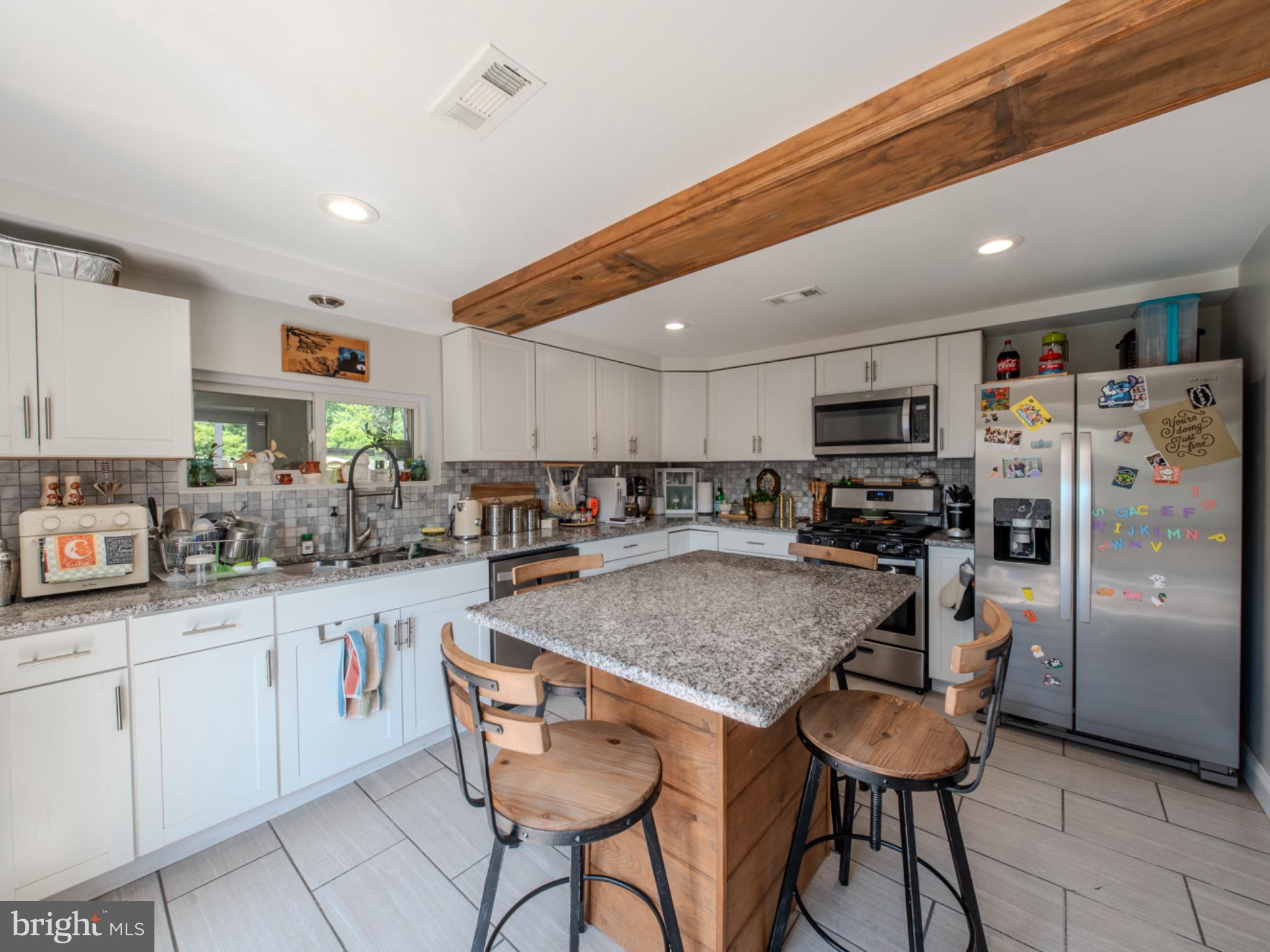 4005 Tuckahoe Road Williamstown, NJ 08094 - Photo 10 of 22 Modern kitchen with rustic charm.
