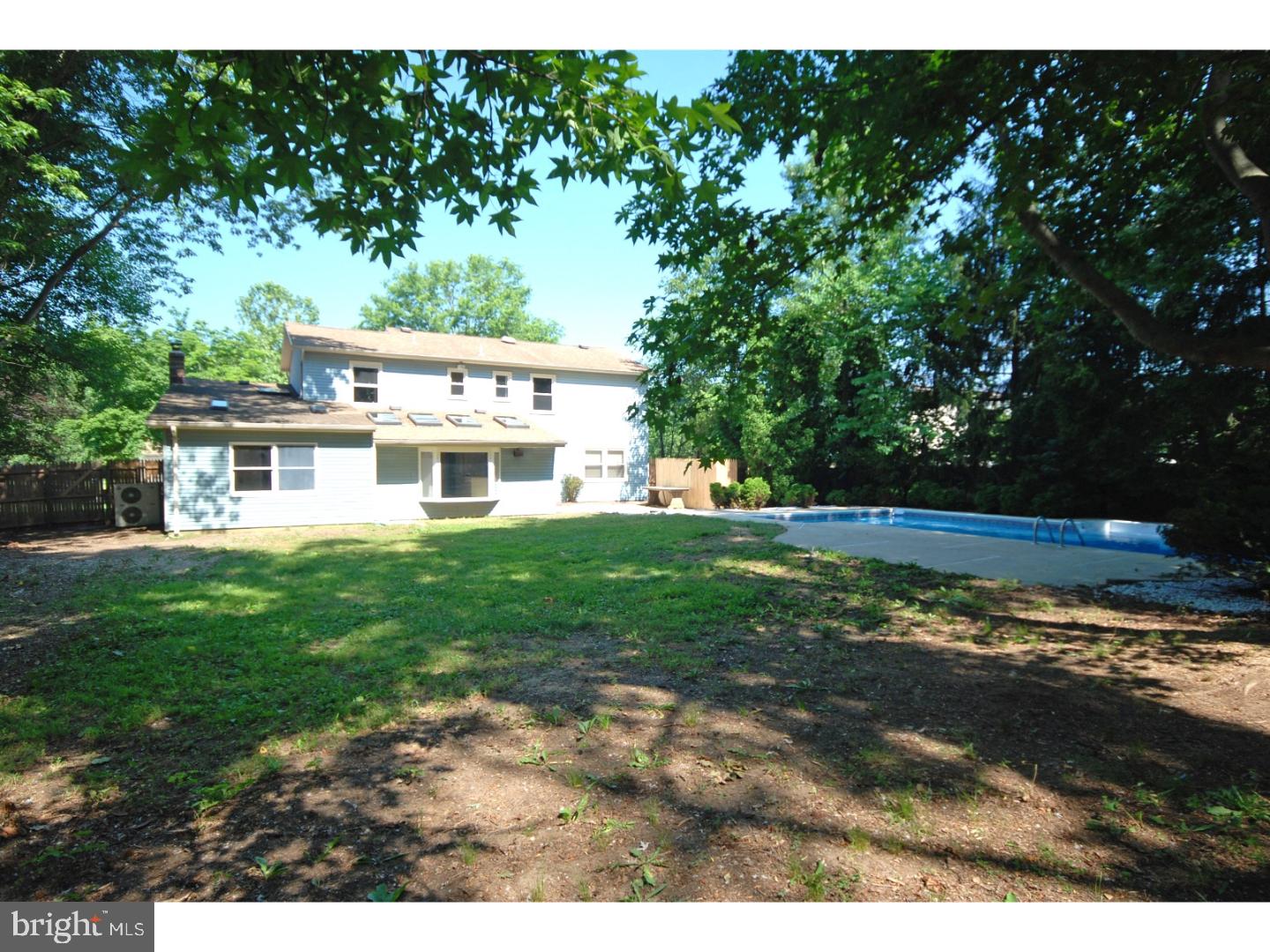 39 Lexington Road Freehold, NJ 07728 - Photo 23 of 24 a front view of a house with a yard