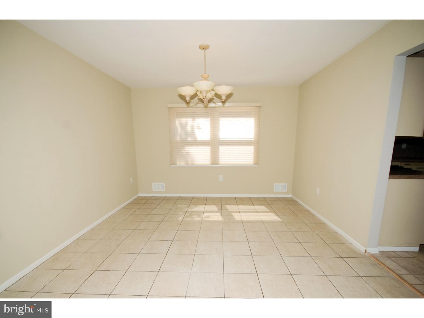 39 Lexington Road Freehold, NJ 07728 - Photo 7 of 24 a view of an empty room and window