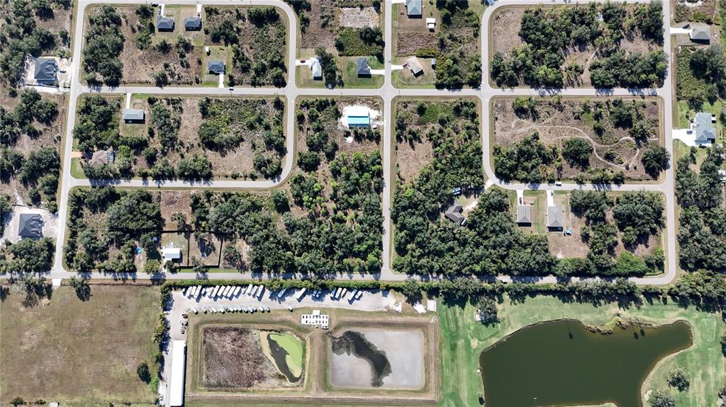 29359 Nottingham Road Punta Gorda, FL 33982 - Photo 6 of 20 an aerial view of residential houses with outdoor space