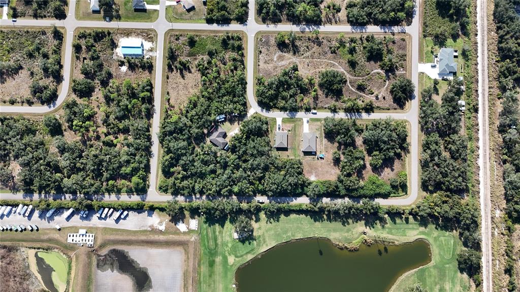 29359 Nottingham Road Punta Gorda, FL 33982 - Photo 10 of 20 a view of swimming pool with outdoor seating and plants