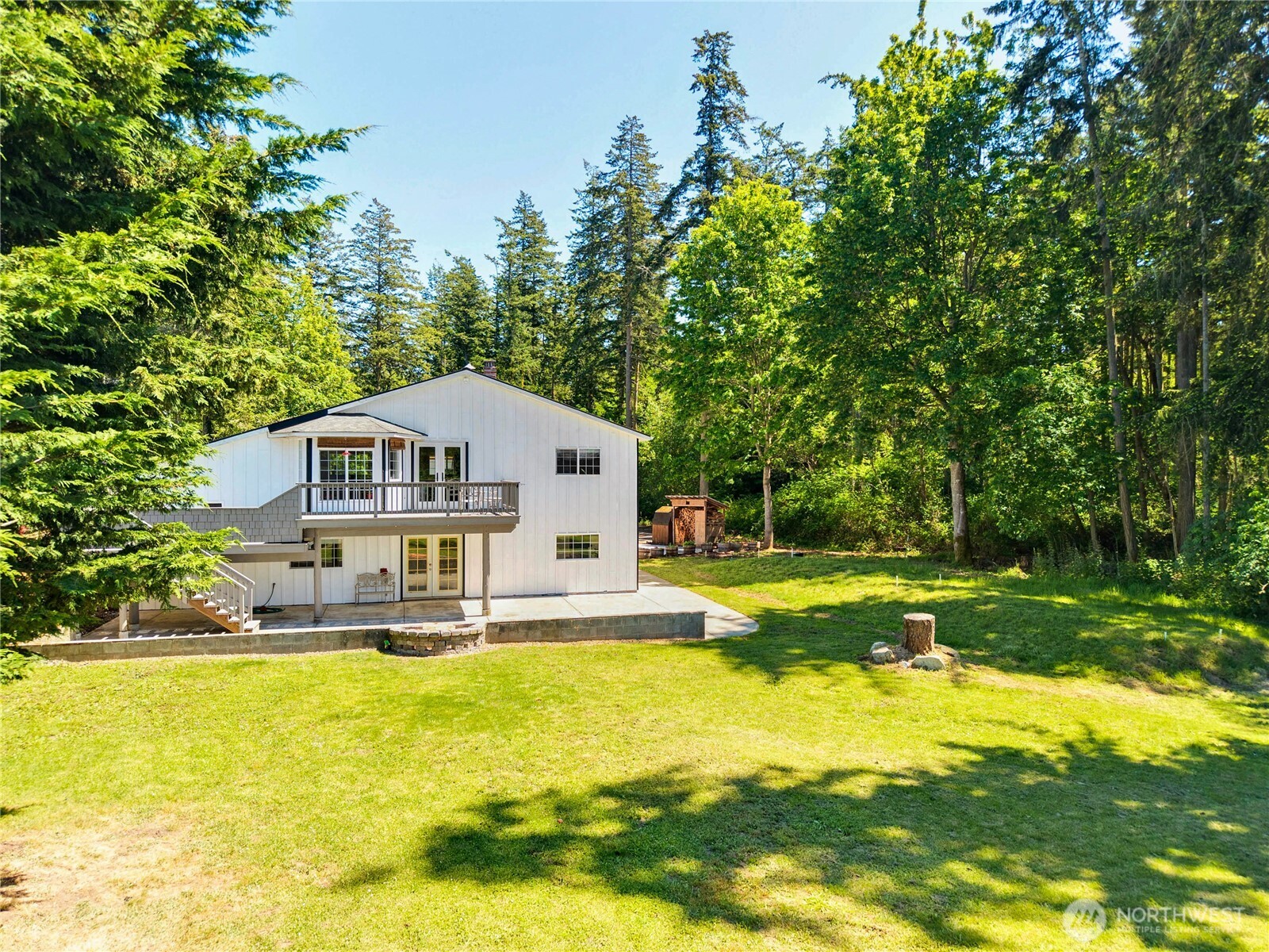 196 Nolton Road Nordland, WA 98358 - Photo 35 of 39 a front view of a house with swimming pool