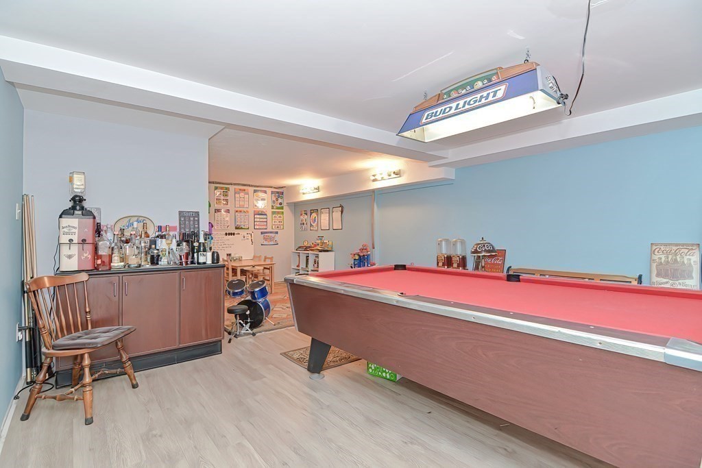 39 Dolan Road Millbury, MA 01527 - Photo 23 of 27 a room with furniture and air hockey table