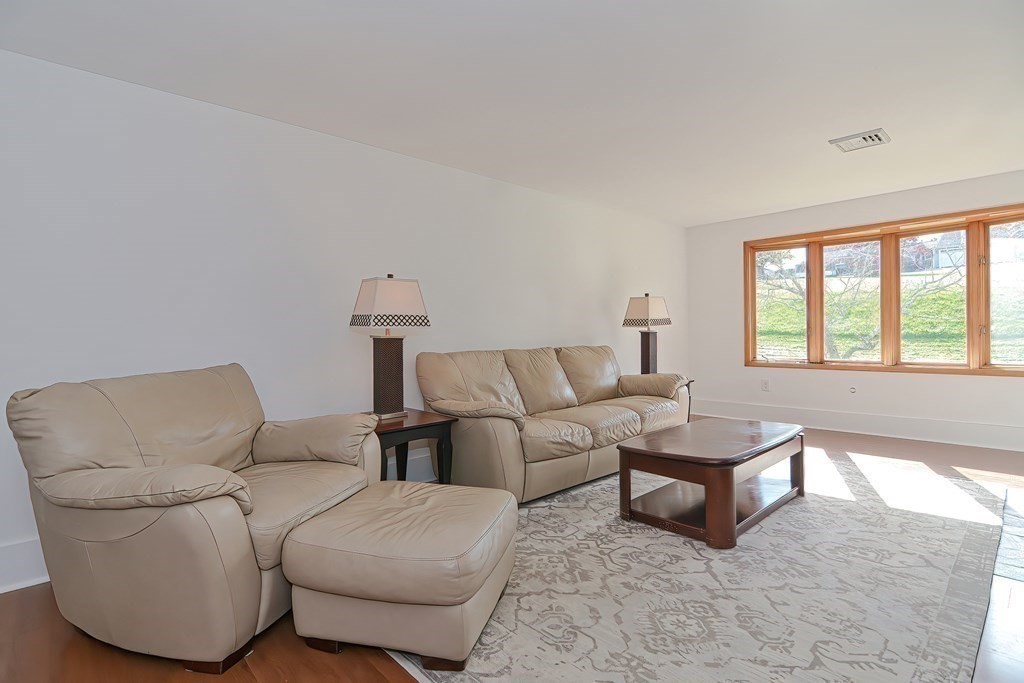 39 Dolan Road Millbury, MA 01527 - Photo 5 of 27 a living room with furniture and a window