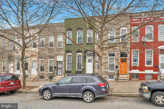 a car parked in front of a building