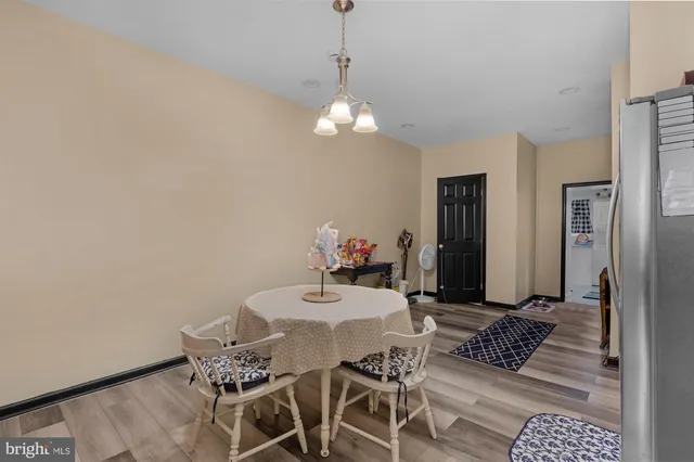 a view of a dining room with furniture