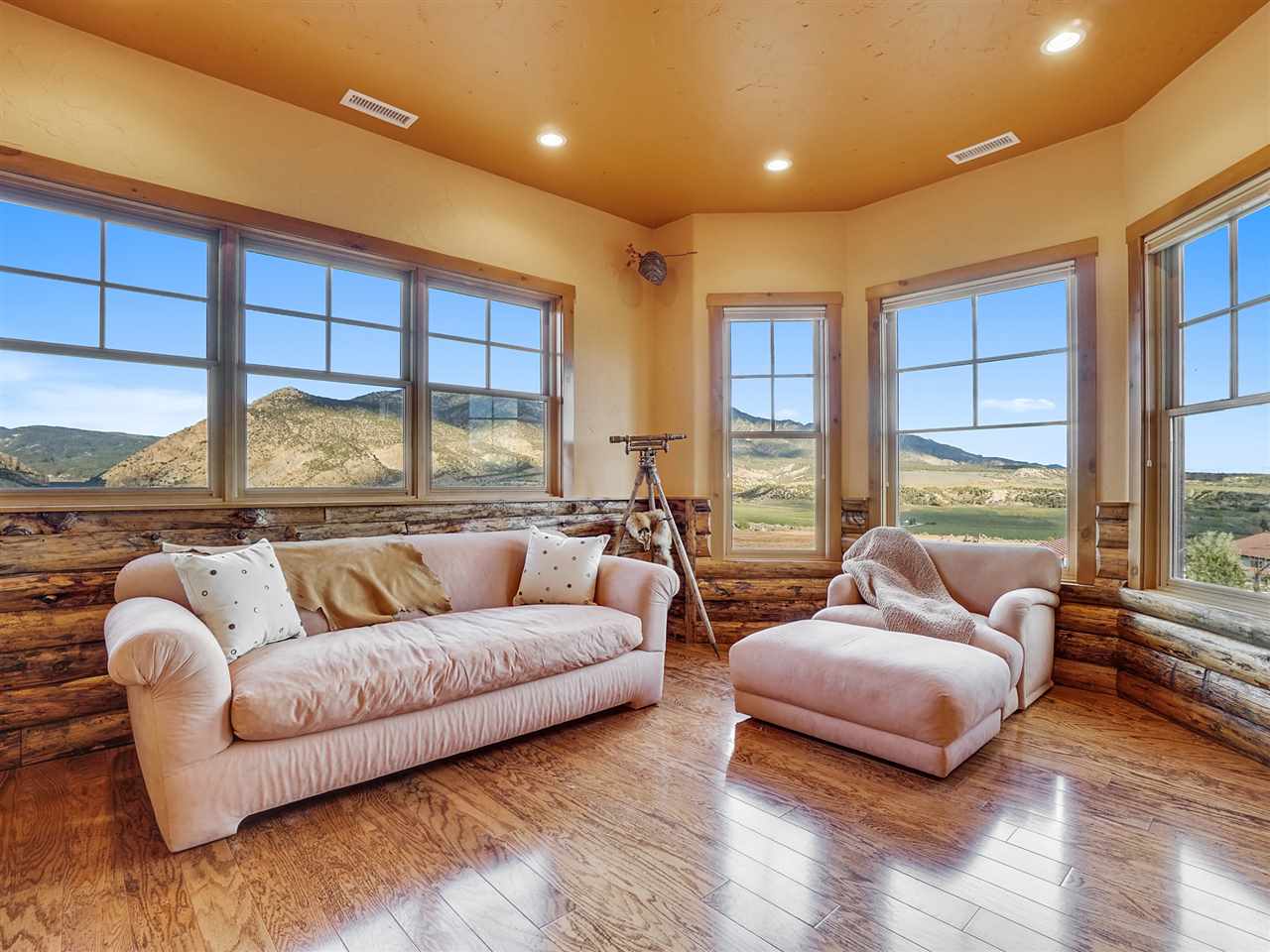 966 Mesa Drive Rifle, CO 81650 - Photo 13 of 31 a living room with furniture and a large window