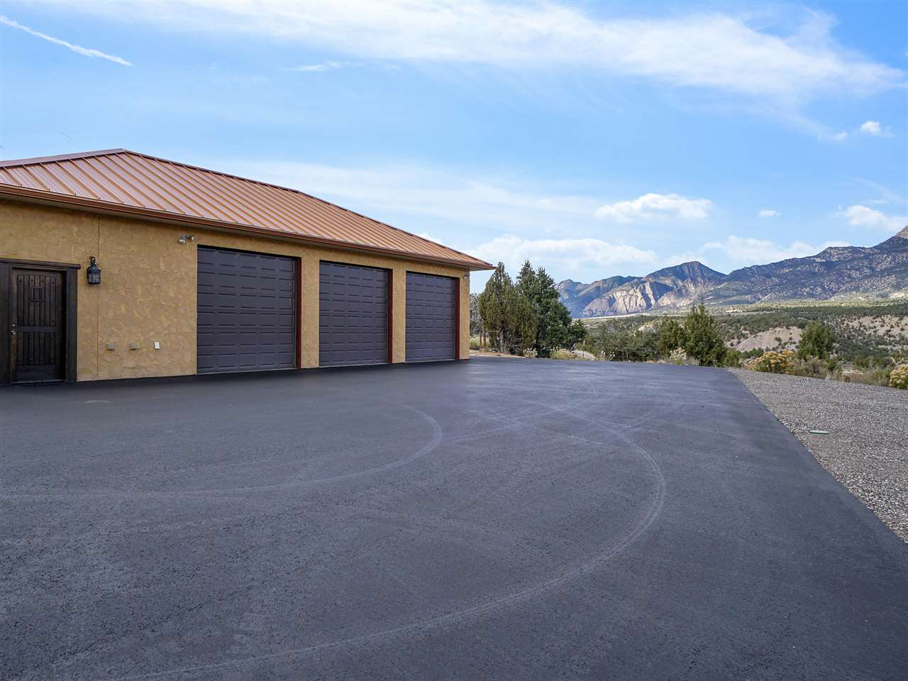 966 Mesa Drive Rifle, CO 81650 - Photo 29 of 31 a view of a house with a yard