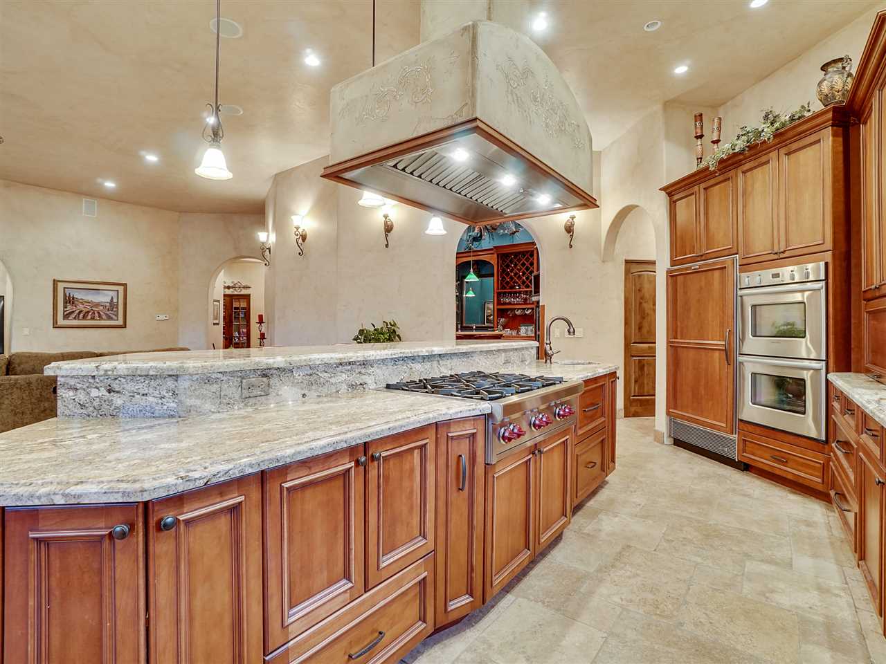 966 Mesa Drive Rifle, CO 81650 - Photo 5 of 31 a kitchen with stainless steel appliances granite countertop a stove a sink and a refrigerator