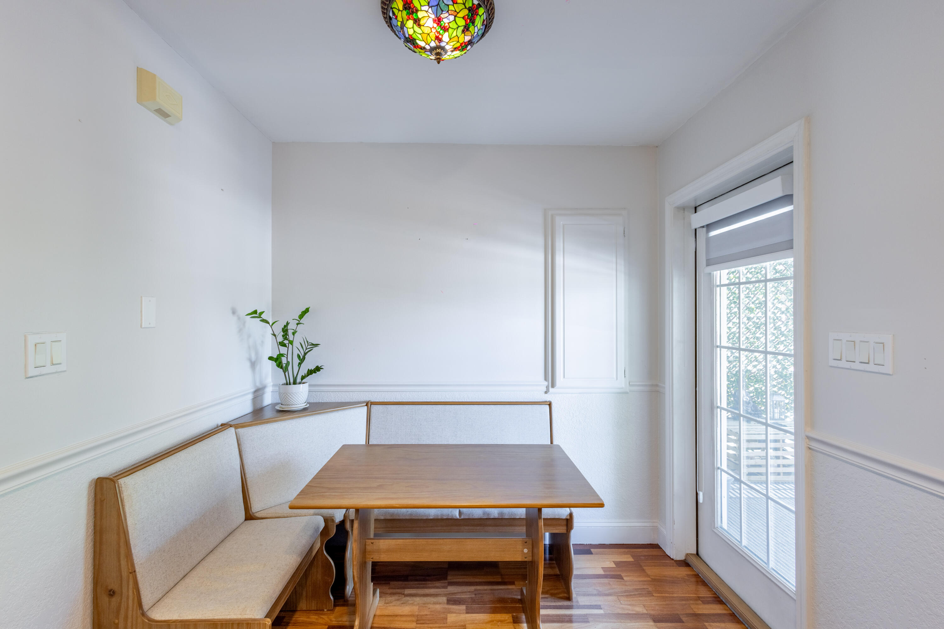 255 Mars Lane Key West, FL 33040 - Photo 14 of 43 a living room with a table and a potted plant