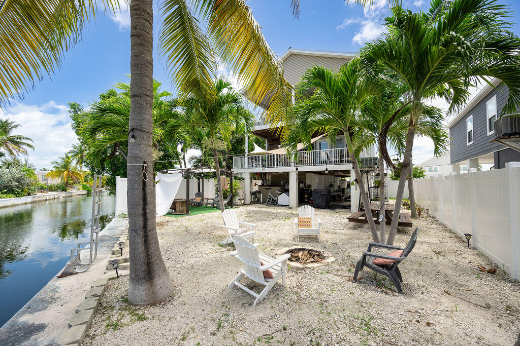 255 Mars Lane Key West, FL 33040 - Photo 33 of 43 a view of a backyard with a patio
