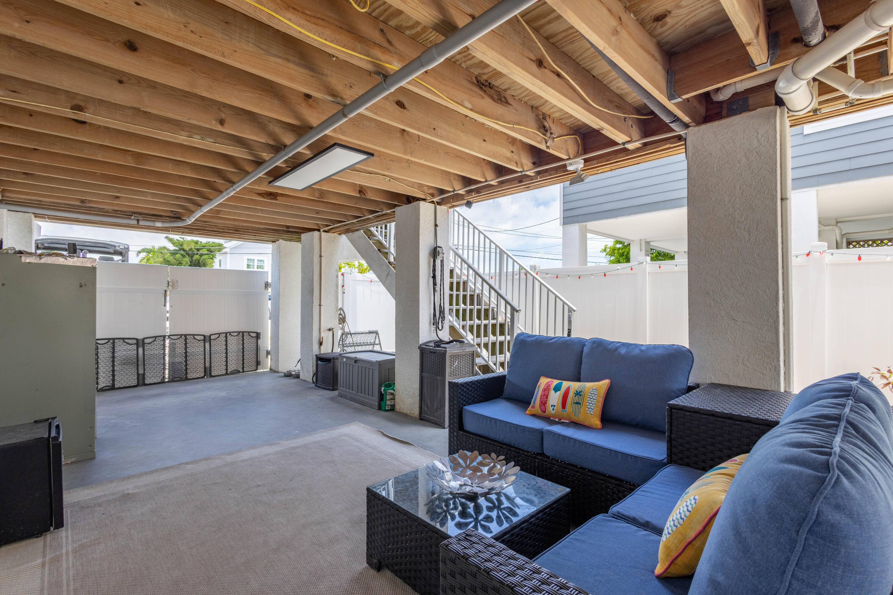 255 Mars Lane Key West, FL 33040 - Photo 41 of 43 a living room with furniture and a wooden floor