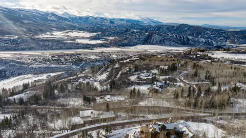 a view of a garden with a pathway