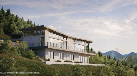 a view of a large building next to a yard