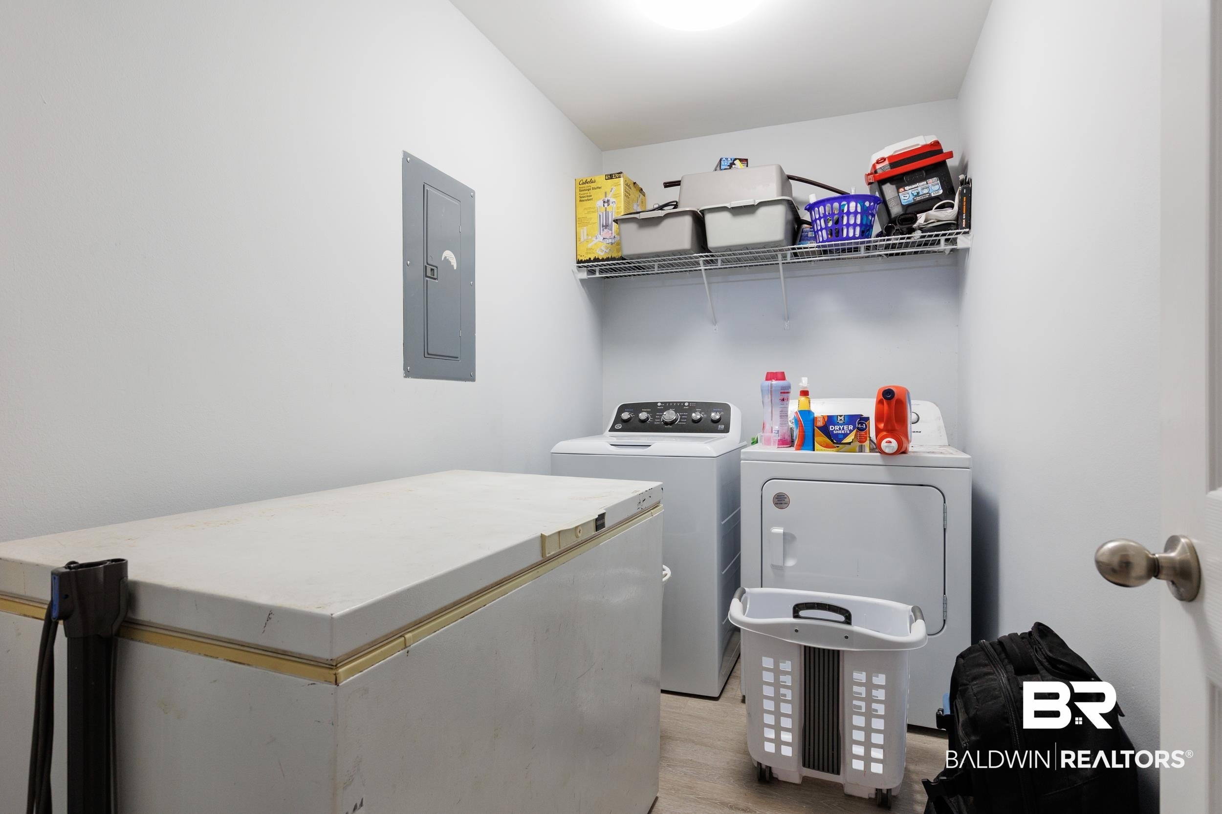 16227 Zenith Drive Loxley, AL 36551 - Photo 20 of 23 Laundry area with electric panel, washer and clothes dryer, and light wood-style floors