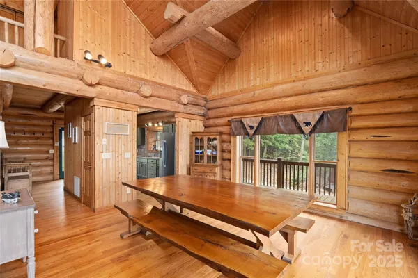 a outdoor space with lots of furniture and wooden floor