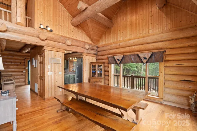 a outdoor space with lots of furniture and wooden floor