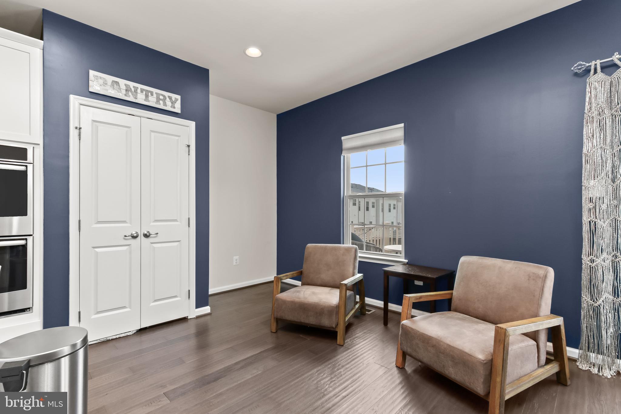 14311 Ridge View Lane Laurel, MD 20707 - Photo 8 of 29 a living room with furniture and a window
