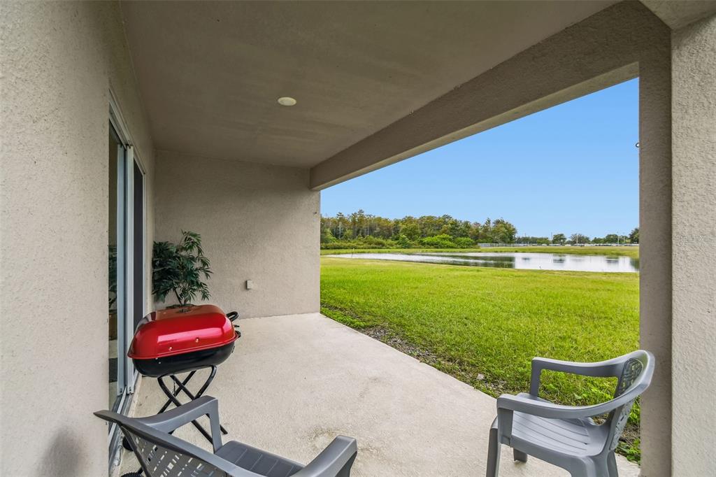 136 Citrine Loop Kissimmee, FL 34758 - Photo 26 of 28 a view of a two chairs in the terrace