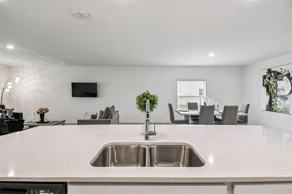 136 Citrine Loop Kissimmee, FL 34758 - Photo 7 of 28 a close view of sink and tap