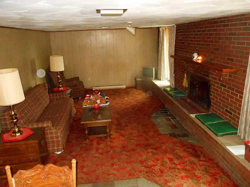 127 Ridge Drive Apollo, PA 15613 - Photo 21 of 25 Basement/Game Room. GAMEROOM WITH BRICK FIREPLACE/HEARTH