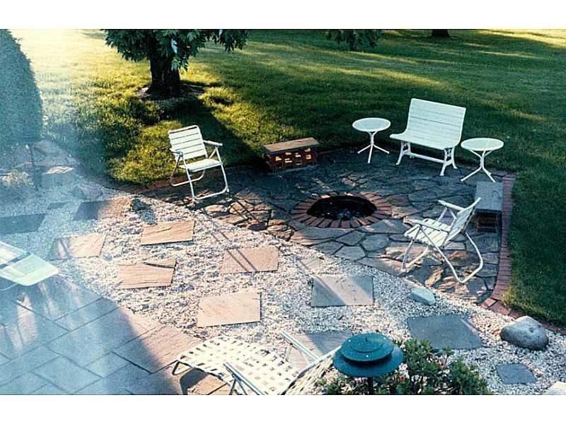 127 Ridge Drive Apollo, PA 15613 - Photo 7 of 25 Patio/Deck. THIS IS A PREVIOUS PICTURE OF PATIO. CURRENTLY BEING TREATED FOR WEEDS.