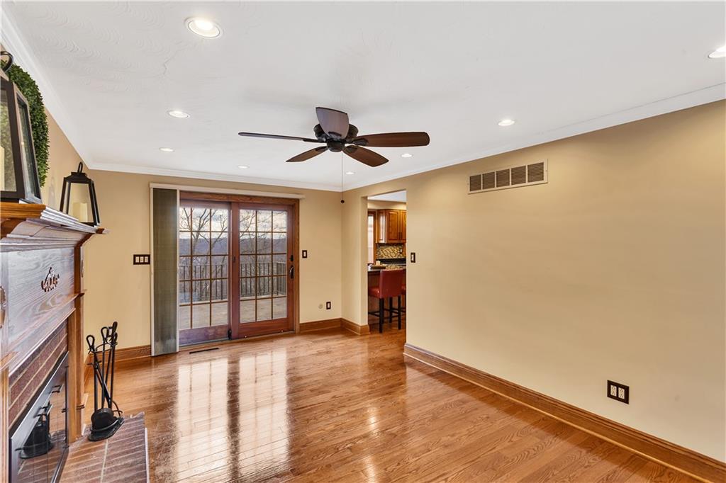 210 Gotham Lane Monroeville, PA 15146 - Photo 15 of 31 a view of livingroom with hardwood floor and a ceiling fan