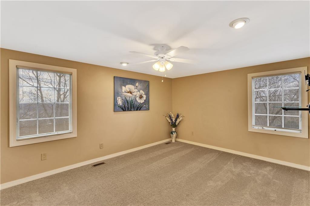 210 Gotham Lane Monroeville, PA 15146 - Photo 17 of 31 an empty room with windows and closet